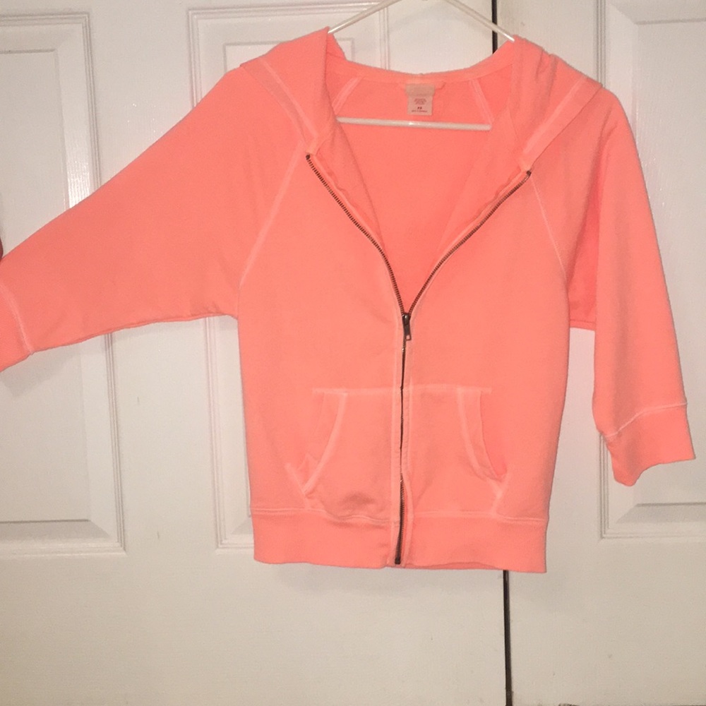 Neon Orange hooded jacket.